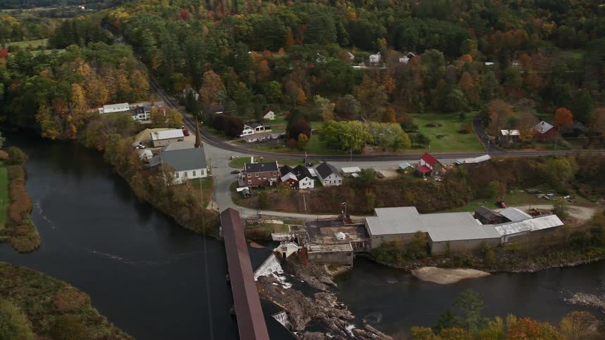 Aerial of the bridge over the river in a small town