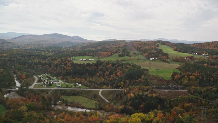 Aerial view of hillside rural landscape with fall colors