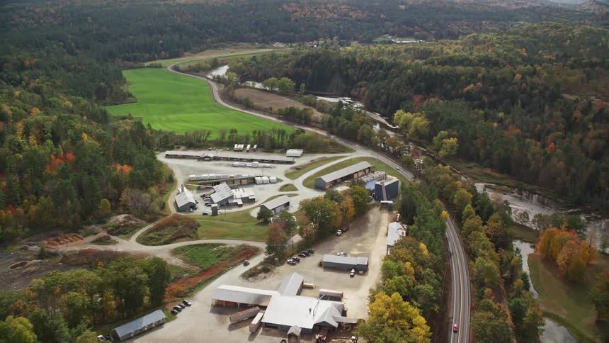 Aerial view of building in the middle of fall landscape