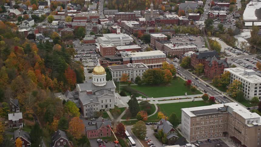 Aerial view of a capitol building on a rural town at evening