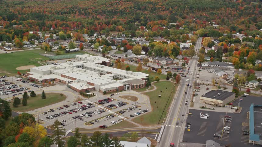 Aerial view of street and campus fall landscape