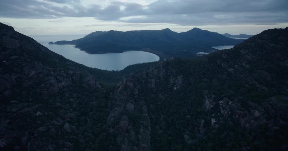 Skyline mountain with the coastline at dusk