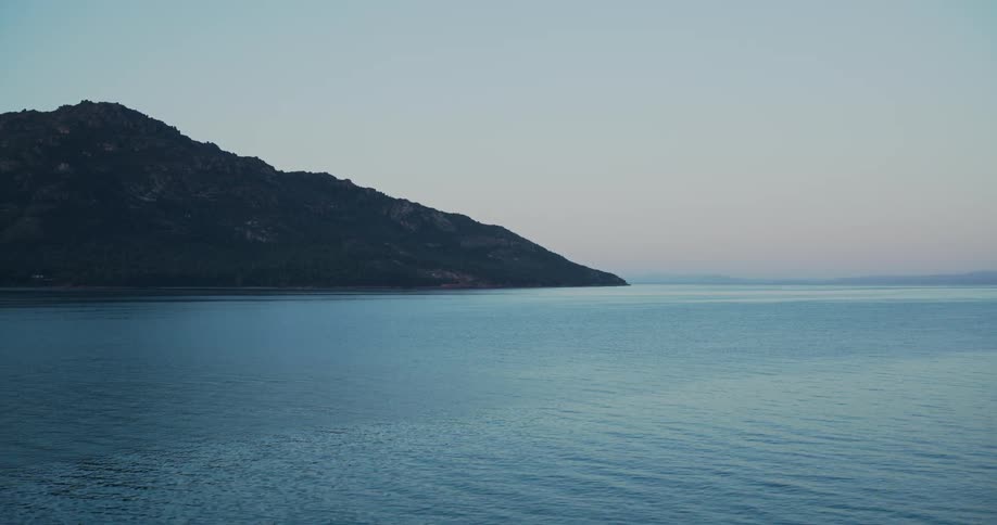Aerial of a mountainous island during sunrise