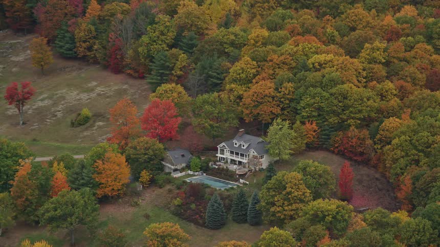 Aerial view house in rural area in fall color
