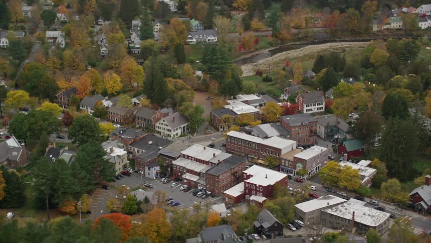 A small town with many houses and trees in the region