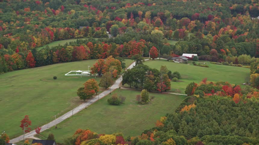 Aerial view of rural house in fall landscape