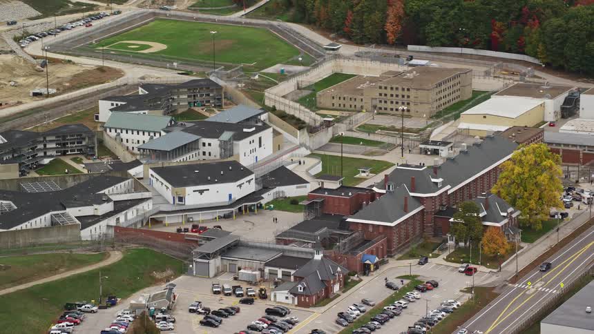 Aerial view of campus red brick buildings in fall