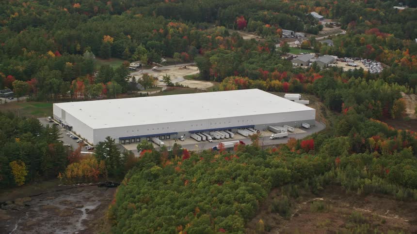 Aerial of a trucking company in a rural town