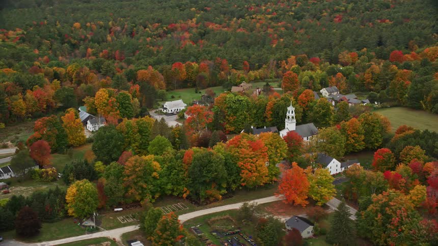 The autumn trees surround the rural town