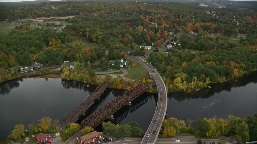 Aerial view of fall landscape road bridge over river