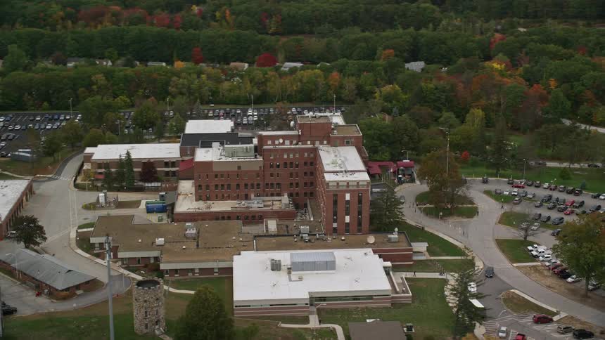 Aerial view of a hospital and a parking lot