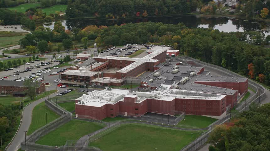 Aerial view red brick buidlings on campus in fall landscape