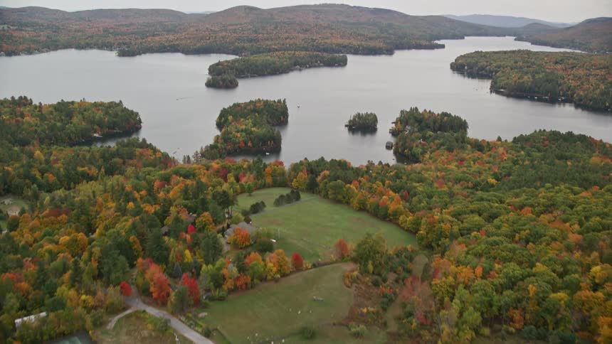 A rural region with many trees and a huge lake