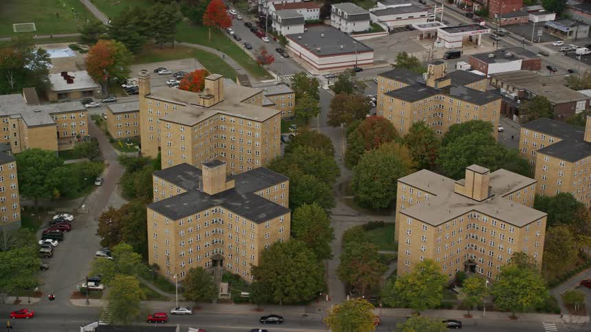Aerial view of yellow apartment buildings in the residential neighborhoods