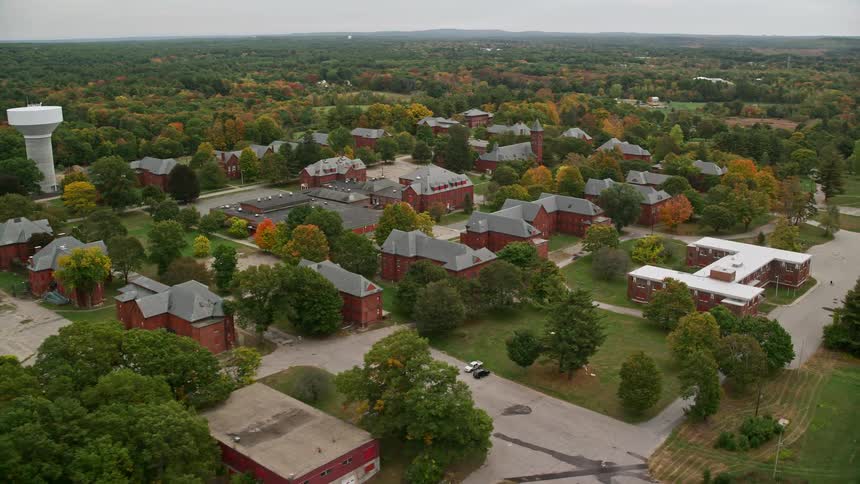 Aerial of an apartment complex in a rural town