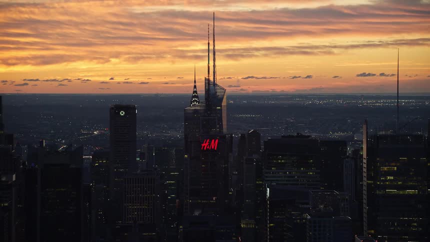 Skyline of a big city with skyscrapers at dusk