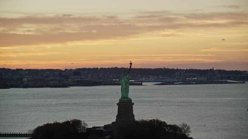 Statue of liberty in new york city at dusk