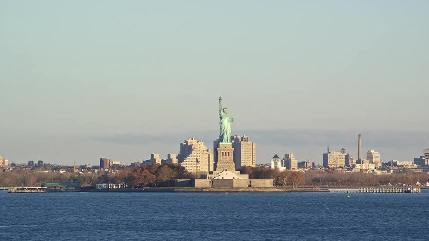 The statue of liberty in new york during a sunny day