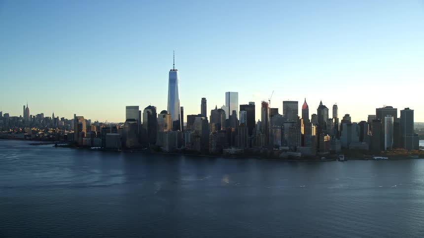 Numerous tall skyscrapers fill the skyline of a metropolitan city
