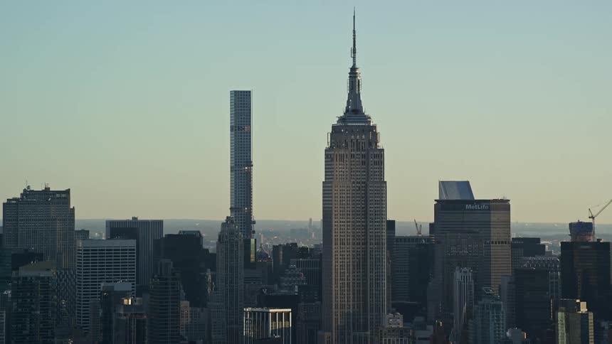 A city with lots of skyscrapers towers and high rise building