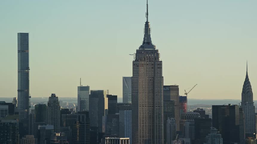 The city is full of very tall buildings