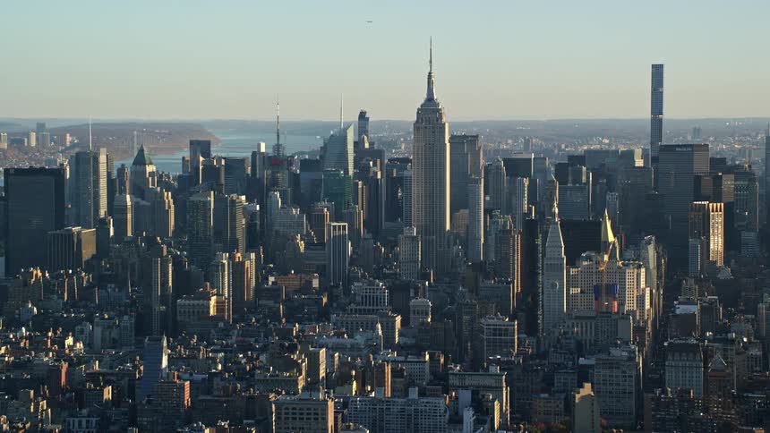 Panoramic aerial view of manhattans urban landscape with the variegated cityscape extending towards the horizon