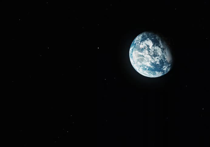 Deep in space the earth is seen from a distance with few stars beside it