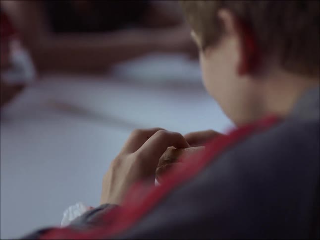 Boy eating a sandwich