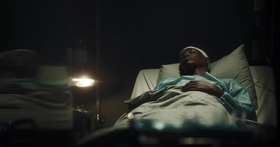 A man is sleeping in the hospital