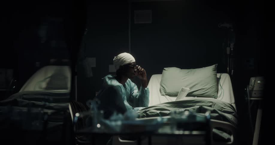A hospital patient is reading