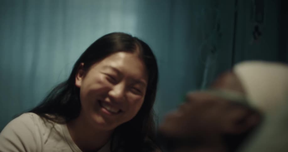 A woman arrives at the side of a patient in the hospital and they start talking