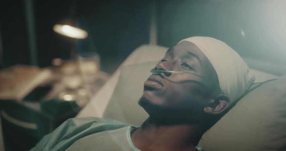 Man lying on the hospital stretcher