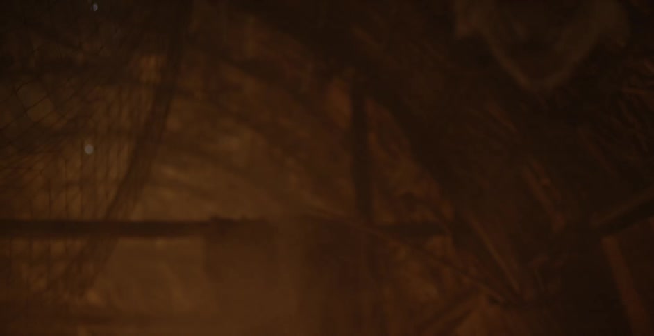 Smoke and light flickers in a dark room