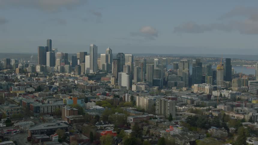 View of a large city next to a body of water
