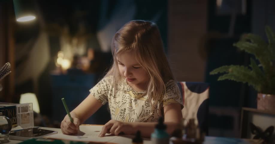 A girl doing school work at home