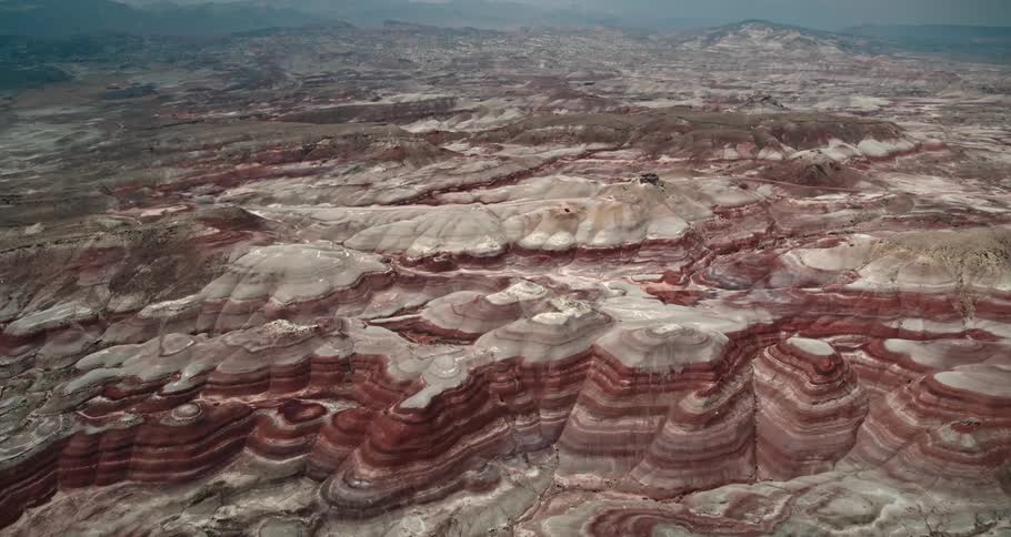 An aerial view of the badlands with random rock formations