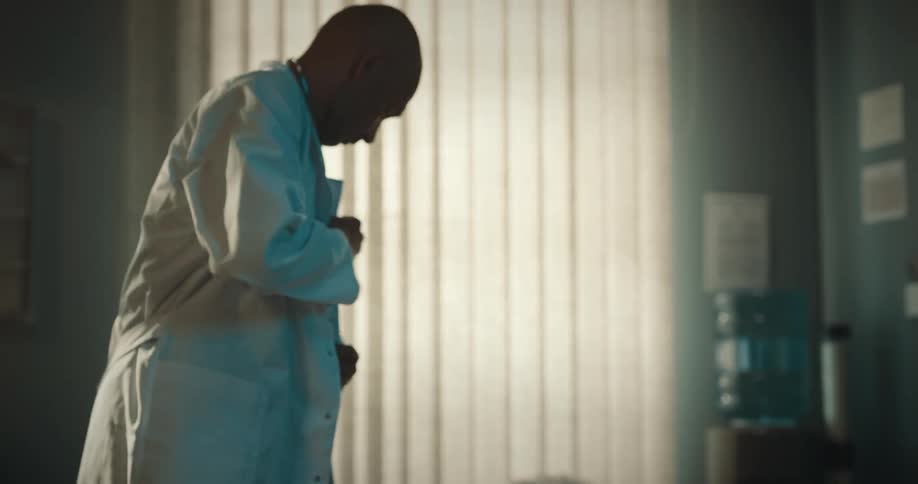 A doctor performing an examination on a patient
