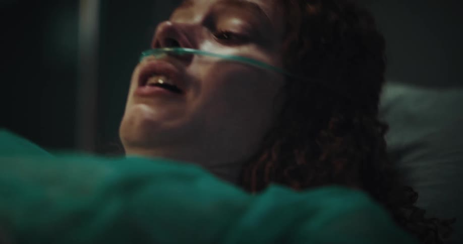 Female patient sleeping waking up startled and starting to cry