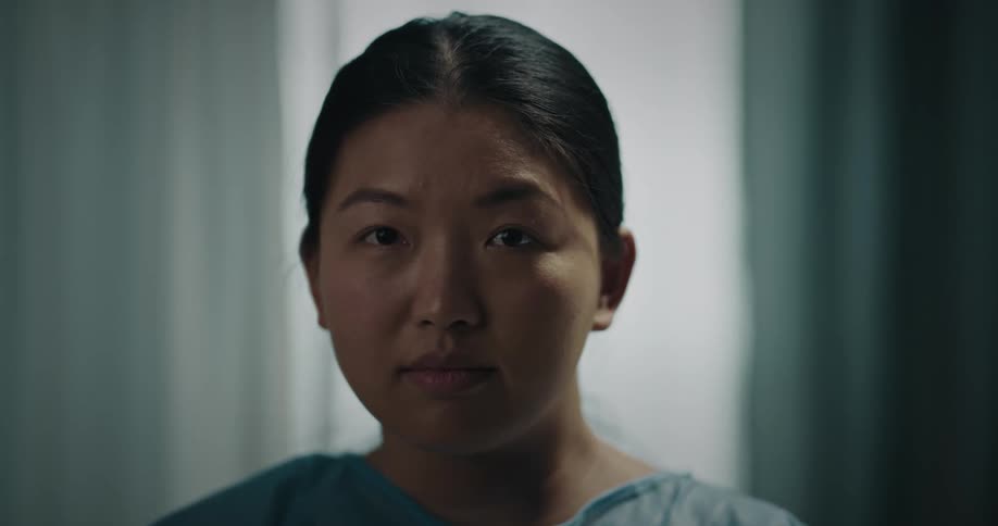 Portrait of an asian woman in an indoor setting