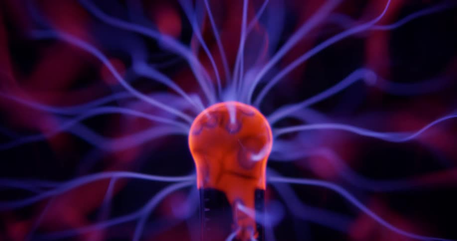 Glowing purple wisps extend into pink illuminated energy from a phosphorescent pink object