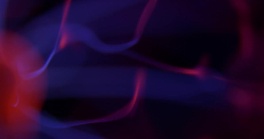 Glowing pink and purple waves are stretching and moving across the darkness