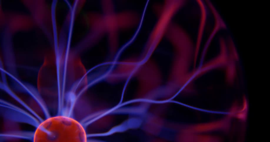 Glowing purple wisps extend into pink illuminated energy from a phosphorescent pink orb