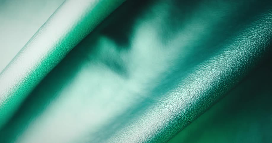 Light brightens revealing folded textured fabric
