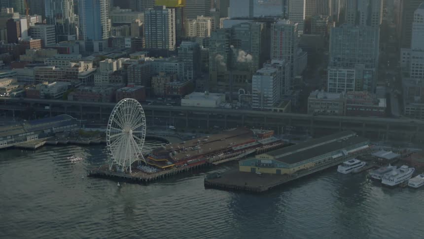Aerial view of a large city next to a river