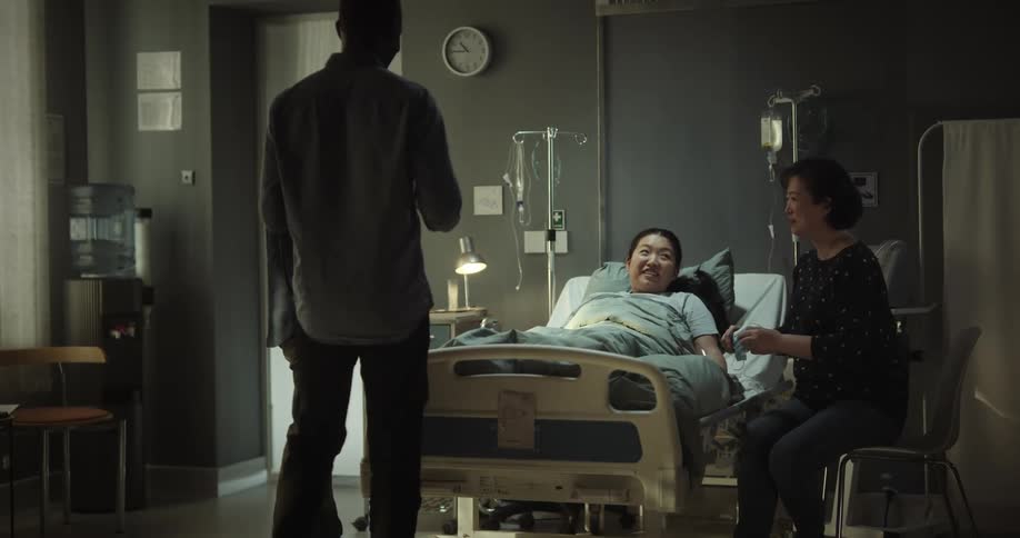 A patient in the hospital smiling for the photo
