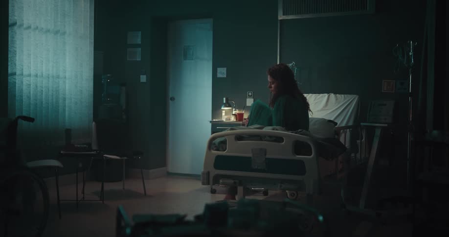 A sad girl in a hospital room