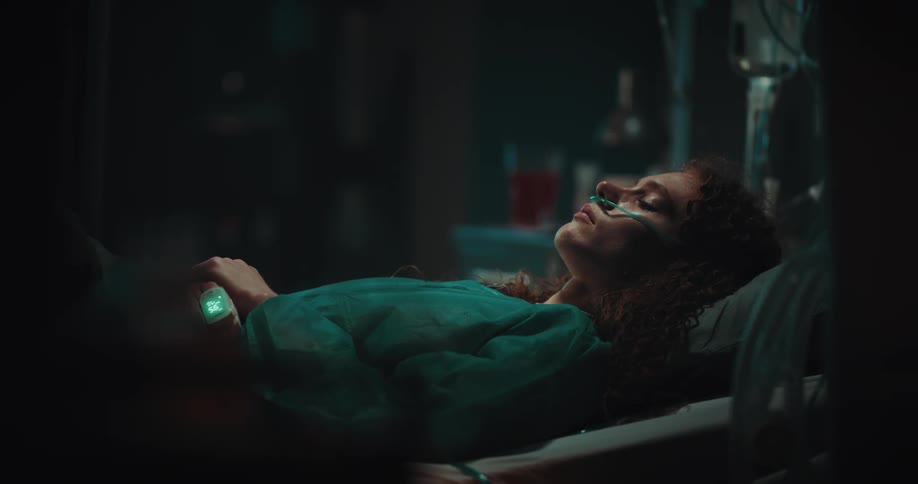 Patient sleeps in hospital bed at night