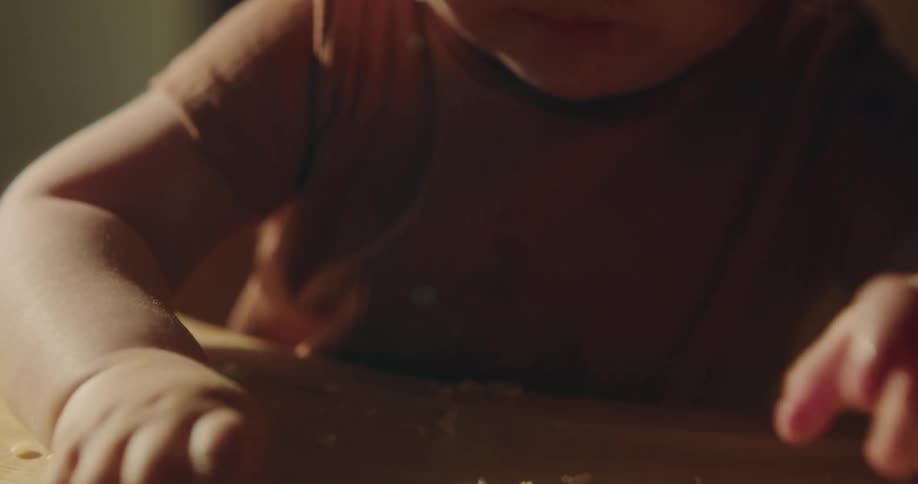 A clip of a young kid eating