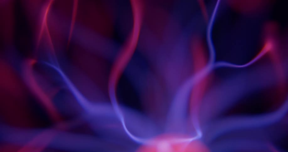 Glowing purple and pink wisps waver and extend from a luminous pink orb