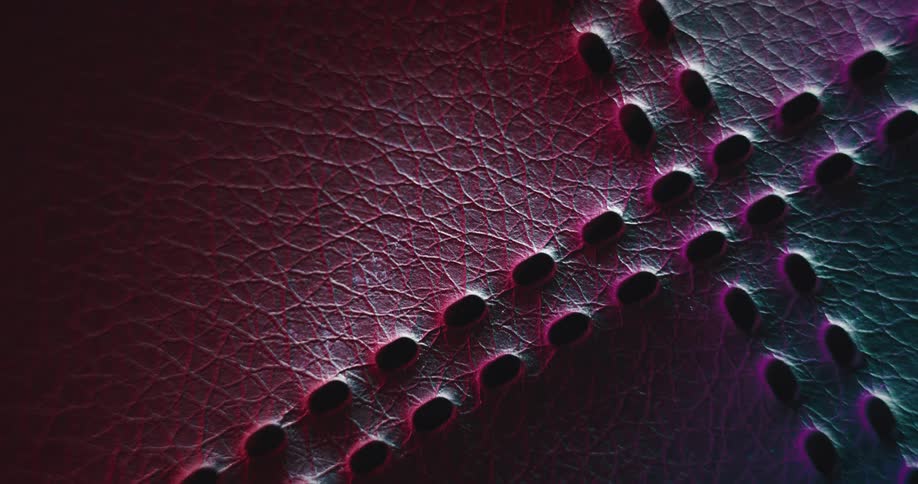 Several holes on a pink and purple surface